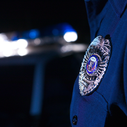 austin police in uniform with badge